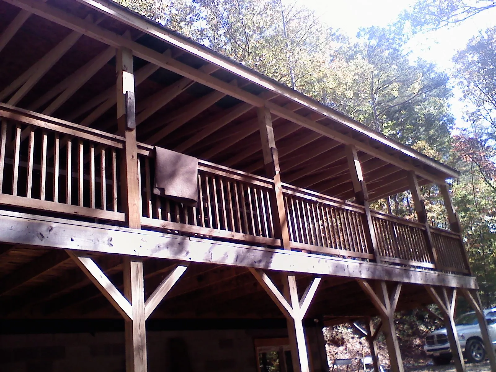 Timber framing under a new elevated porch and deck — Roof Leak Repair in Swansea by Roofing Brothers